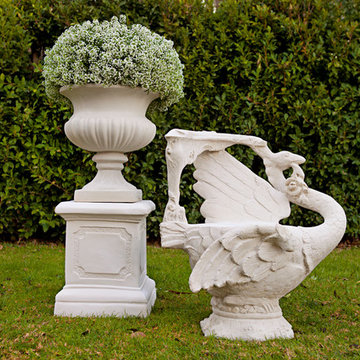 Bell Urn on Paneled Pedestal with Swan Chair