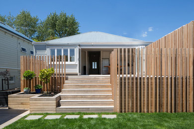 Photo of a modern home design in Auckland.