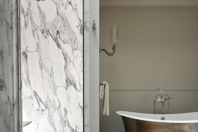 Inspiration for a contemporary single-sink bathroom remodel in San Francisco with beige walls and marble countertops