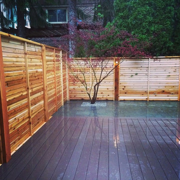 PVC Deck, cedar fence, and interlocking
