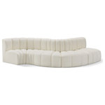 Meridian Furniture - Arc Vegan Leather Upholstered 5-Pc. S-Shaped Modular Sofa, Cream - Unleash modern opulence with the Arc Vegan Leather 5pc. Sectional. Crafted for the modern connoisseur, this Sectional injects an air of refined luxury into any space. Its sleek silhouette, upholstered in supple cream vegan leather, exudes timeless sophistication while the deep channel tufting adds textural intrigue, further elevating the chair's visual appeal. The modular design makes it a versatile chameleon, effortlessly adapting to your evolving needs and preferences. Whether you envision it gracing a chic living room corner, basking in the glow of a bedroom window, or adding a touch of drama to a home office, the Arc seamlessly complements your unique interior aesthetic.