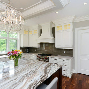 Large Island with Granite Counter & Stunning Chandelier