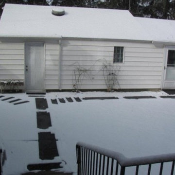 Brent easily gets from his house to his garage in the snow