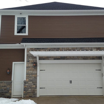 Stylecrest Staggered Shake siding and Kentucky Gray Limestone