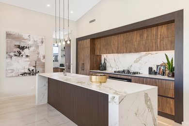 Photo of a contemporary kitchen in Sydney with a drop-in sink, flat-panel cabinets, dark wood cabinets, white splashback, stone slab splashback, with island, grey floor and white benchtop.