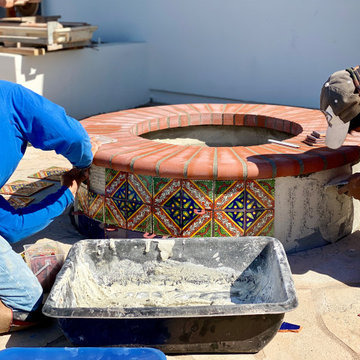 Installing Mexican Tile on a New Fire Pit in Crown Point