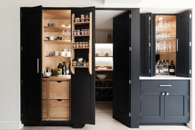 Contemporary home bar in Other.