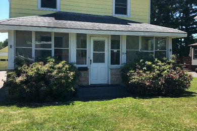 This is an example of a country porch design in New York.