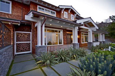 Inspiration for a large timeless two-story wood exterior home remodel in San Francisco