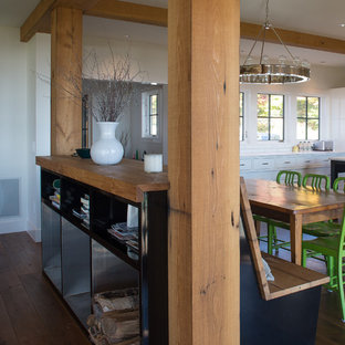 Large farmhouse kitchen pantry appliance - Example of a large country u-shaped medium tone wood floor kitchen pantry design in Burlington with recessed-panel cabinets, white cabinets, marble countertops, white backsplash, subway tile backsplash, stainless steel appliances, an island and an undermount sink