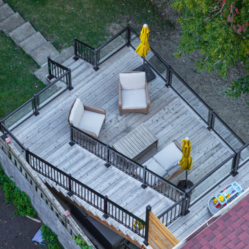 2024 Multi-Level Backyard Deck with Custom Railings and Seating Areas