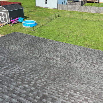 New flat roof on sunroom.