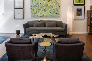 Inspiration for a mid-sized contemporary open concept concrete floor living room remodel in Chicago with white walls, no fireplace and no tv