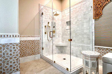 Example of a mid-sized stone tile limestone floor, double-sink and wood wall corner shower design in Sacramento with recessed-panel cabinets, medium tone wood cabinets, an undermount sink, quartz countertops, white countertops, a niche and a freestanding vanity