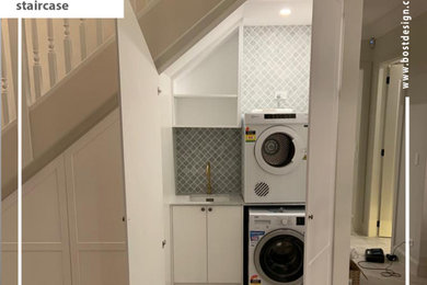 Small laundry room in Sydney.