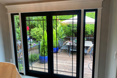 Large elegant dining room photo in Portland with gray walls