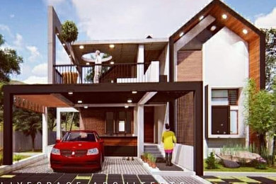 Example of an island style home design design in Other