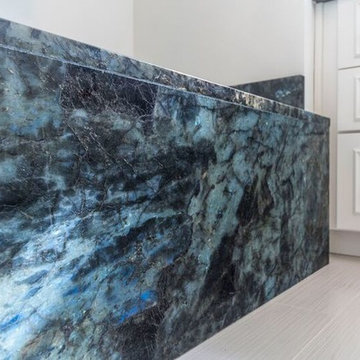 Luxurious White and Teal Glass Master Bathroom