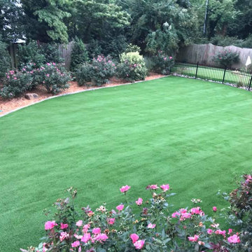 Synthetic Grass and Grotto Hardscapes