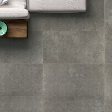 Modern white livingroom with large cement look porcelian tile