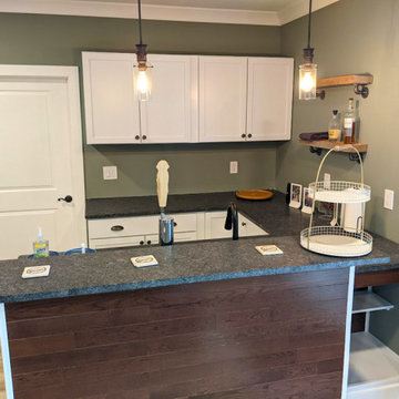 Finished basement wet bar with beer tap