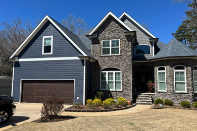 Example of an arts and crafts exterior home design in Other