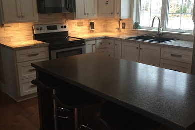 Example of a classic kitchen design in Other