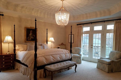 Bedroom - traditional master bedroom idea in Other with beige walls