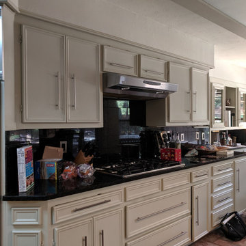 BEFORE: Cooktop wall. Replaced with 48" range