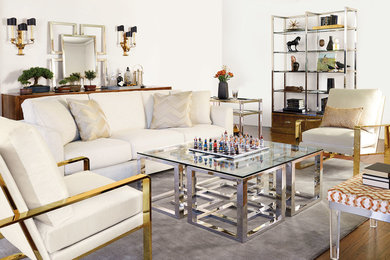Mid-sized trendy enclosed medium tone wood floor living room photo in Other with white walls, no fireplace, no tv and a bar