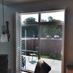 Crestview Shutters using large Deco frame and bi-fold track shutters - Interior Shutters