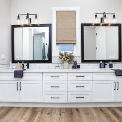 Woven Wood Roman Shade by Budget Blinds of Sherwood Park in this Modern Farmhouse Master Bathroom - Roman Shades