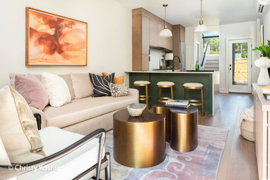 Small trendy open concept vinyl floor and multicolored floor living room photo in DC Metro with white walls and a wall-mounted tv