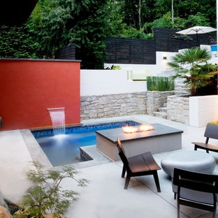 Idee per un piccolo patio o portico moderno in cortile con graniglia di granito