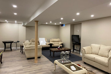 Example of a trendy basement design in Toronto