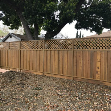 Exterior finished painted fence with a cabot stain