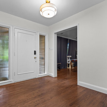 Contemporary Foyer With Hardwood Floors