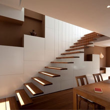 floating stair and decor wall behind
