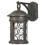 Designers Fountain - Ellington 1 Light Outdoor Wall Light, Mediterranean Patina - Chambery outdoor dark sky lanterns are the latest in outdoor lighting design. The fixture is designed to focus the light downward where it is needed and prevent the unwanted glare from spreading upward and outward. This collection features an intricate pattern of scroll grill work with a solid Mediterranean Patina finish that complements the exterior decor of any home. The sturdy, weather resistant cast aluminum construction along with waterproof seal protects the lantern from harsh outdoor elements to ensure the long life of the fixture. These outdoor lights install easily and deliver welcoming, safe and reliable exterior lighting. This collection's delicate pattern of scroll grill work is offered in two finishes; Mediterranean Patina and Oil Rubbed Bronze.