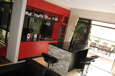 Design ideas for a modern home bar in Brisbane.