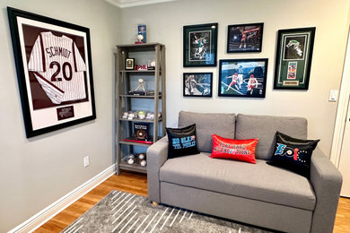 Example of a transitional family room design in New York