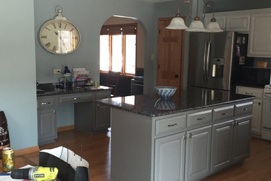 Kitchen refinished in white dove.Island/desk refinished in grey dolphin