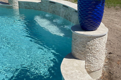 Example of an island style pool design in Houston