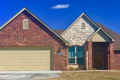 Rustic exterior home idea in Other