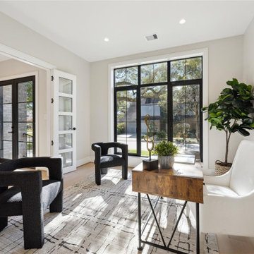 Bright corner office with natural light and modern sculptural seating
