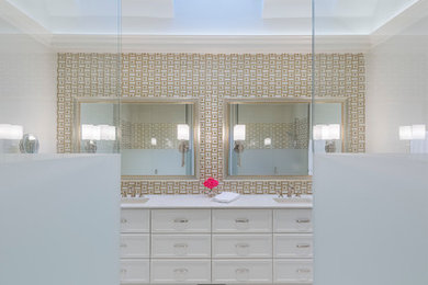 Example of a mid-sized classic master white tile and glass tile porcelain tile walk-in shower design in Chicago with beaded inset cabinets, light wood cabinets, quartz countertops, a one-piece toilet, white walls and an integrated sink