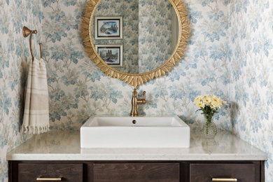 Example of a transitional powder room design in Seattle