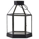 Serene Spaces Living - Hexagon Glass Lantern - The antique black iron framed hexagonal lantern with clear glass panels looks classic. Use it as the highlight of your table, with other smaller lanterns and bud vases with flowers surrounding it. A 3 inch square pillar candle is perfect for it. Size: 11.5in H x 7in D