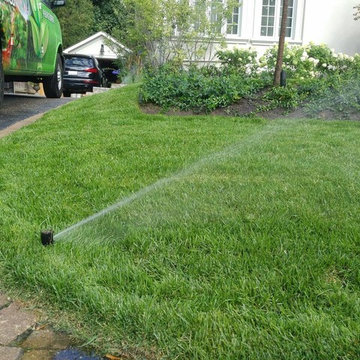Traditional Home with Sprinkler System & Landscape