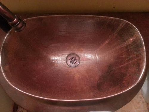 cleaning copper bathroom sink